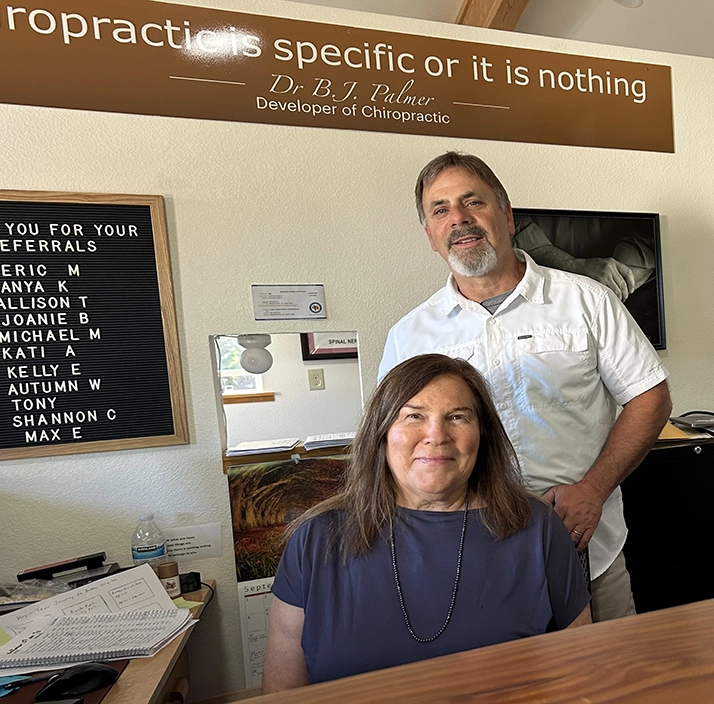 Dr. Richard Doble, D.C. with Front Desk Manager Michele Aubin at the Doble Chiropractic front desk in Sebastopol CA